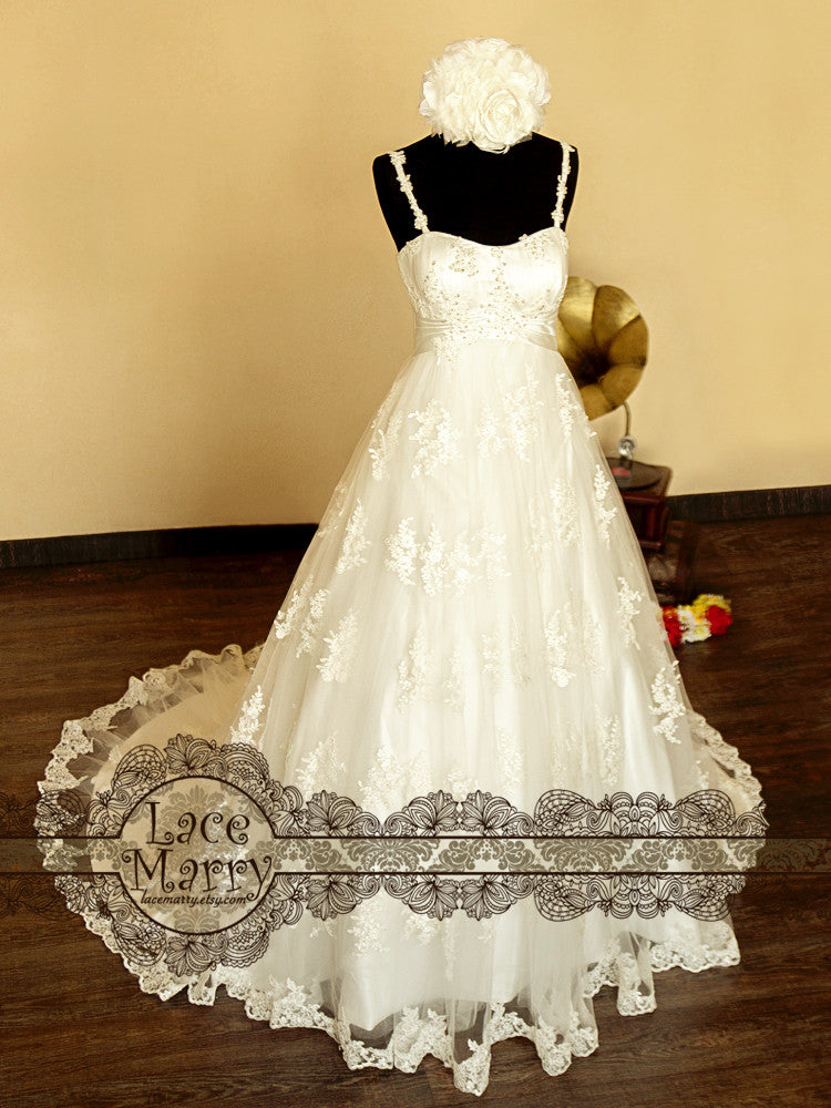 wedding dress with spaghetti straps and flower applique 